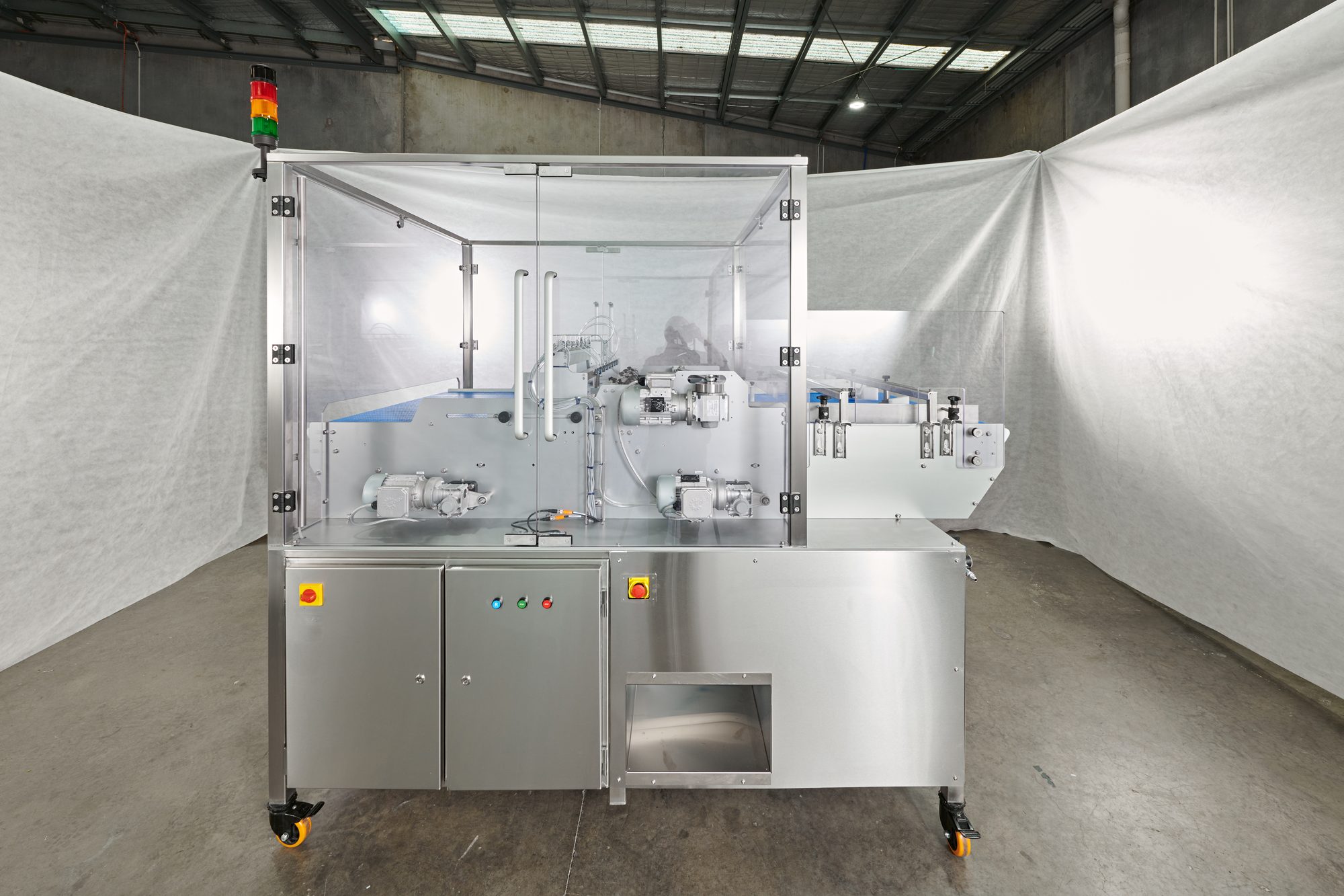 Front of the machine with stainless doors and controls